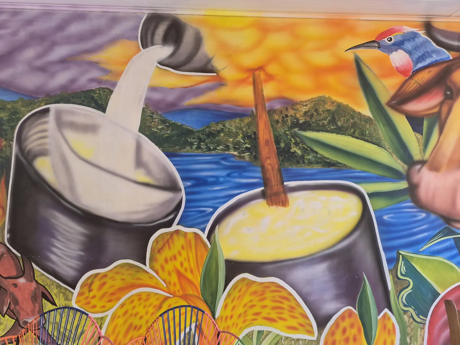 Mural de la quesillería con la leche y la paila